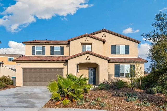 14226 Sonoma Ct, Beaumont, CA 92223 - mediterranean / spanish house with a garage, concrete driveway, stucco siding, and a tiled roof