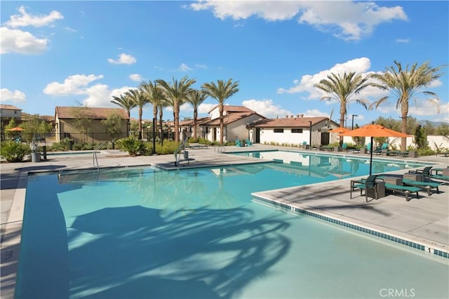 14226 Sonoma Ct, Beaumont, CA 92223 - community pool featuring a patio and a residential view