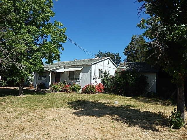 2018 Donnovan Ave, Corning, CA 96021 - rear view of property featuring a yard