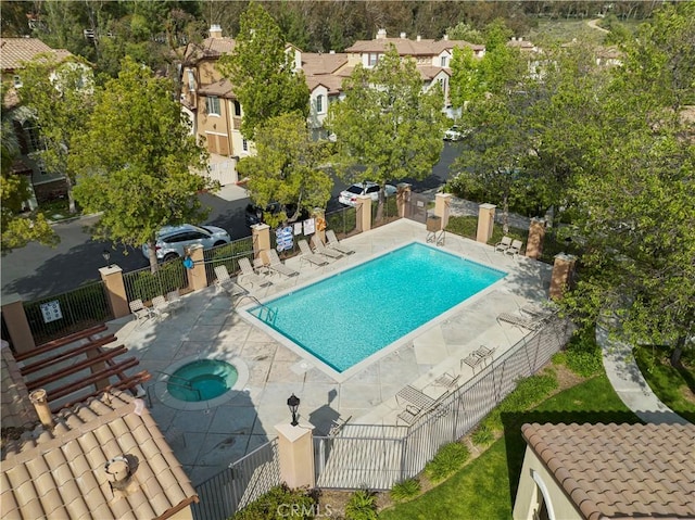 23411 Abbey Glen Pl Unit 41, Valencia, CA 91354 - community pool with a patio area and a community hot tub