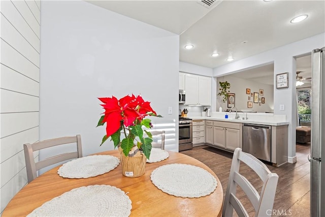23411 Abbey Glen Pl Unit 41, Valencia, CA 91354 - dining area with recessed lighting, dark wood-type flooring, and ceiling fan