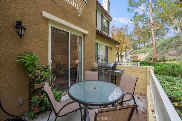 23411 Abbey Glen Pl Unit 41, Valencia, CA 91354 - view of patio / terrace featuring grilling area and outdoor dining area
