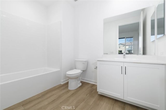 1075 Cadence, Irvine, CA 92618 - full bathroom with toilet, wood finished floors, vanity, shower / bath combination, and baseboards