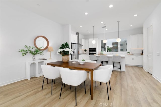 1075 Cadence, Irvine, CA 92618 - dining space featuring light wood-style floors, recessed lighting, and baseboards