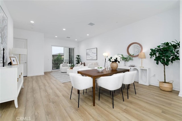 1075 Cadence, Irvine, CA 92618 - dining room with light wood finished floors, recessed lighting, and baseboards
