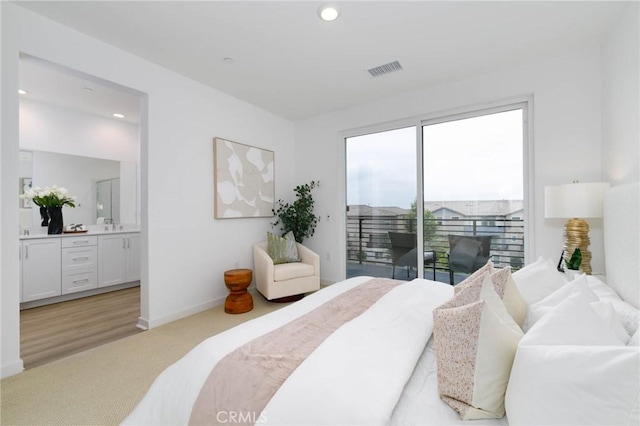1075 Cadence, Irvine, CA 92618 - bedroom with access to outside, light carpet, baseboards, connected bathroom, and recessed lighting