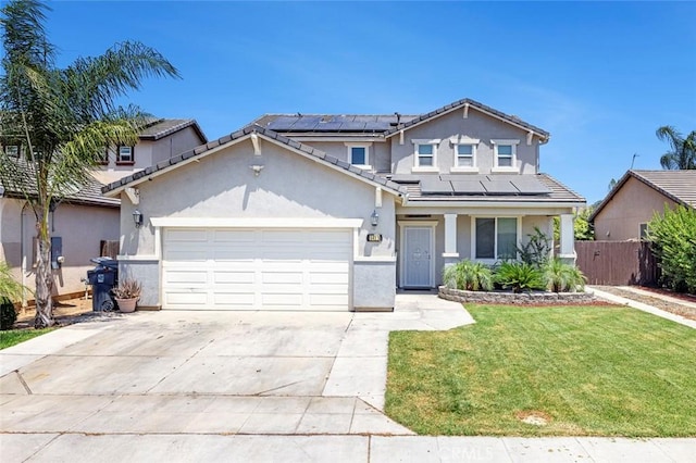 1413 La Quinta Way, Madera, CA 93638 - traditional-style home with roof mounted solar panels, a garage, stucco siding, and concrete driveway