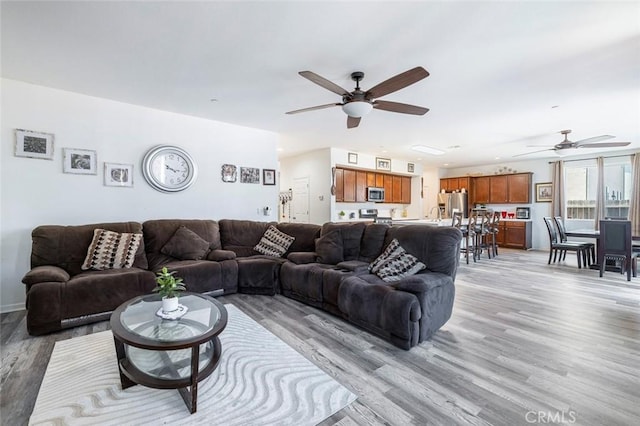 1413 La Quinta Way, Madera, CA 93638 - living room featuring ceiling fan and light wood-style floors