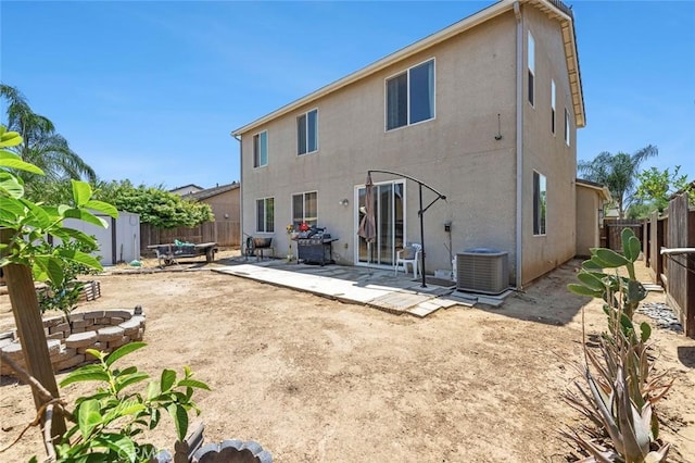 1413 La Quinta Way, Madera, CA 93638 - back of house with stucco siding, a patio area, and a fenced backyard