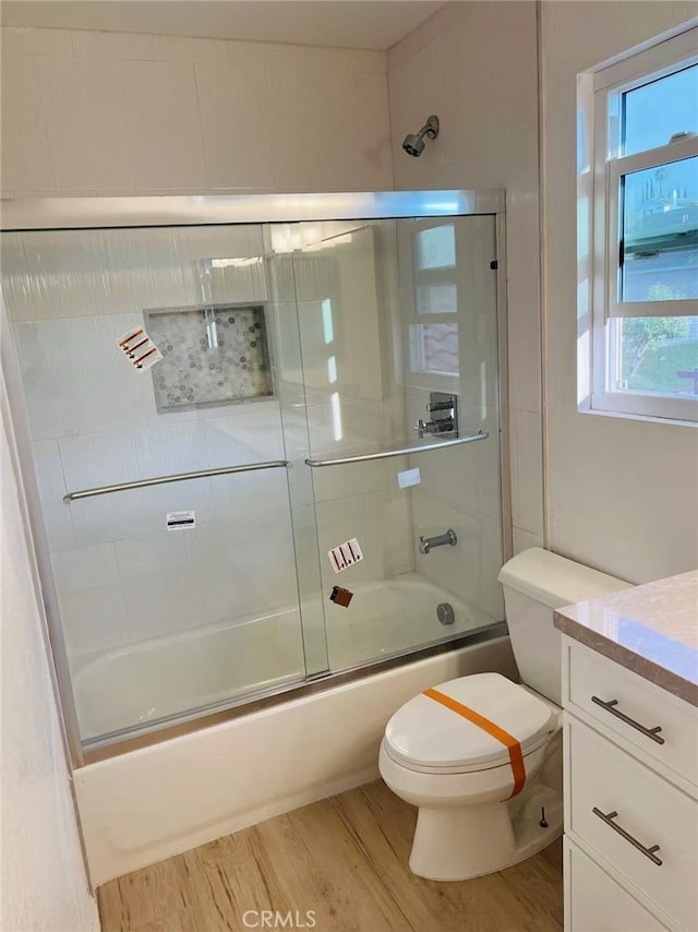 1202 Longview Dr, Diamond Bar, CA 91765 - bathroom with toilet, vanity, wood finished floors, and shower / bath combination with glass door
