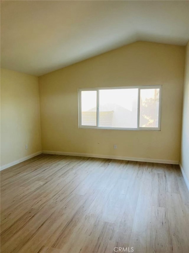 1202 Longview Dr, Diamond Bar, CA 91765 - spare room with wood finished floors, lofted ceiling, and baseboards