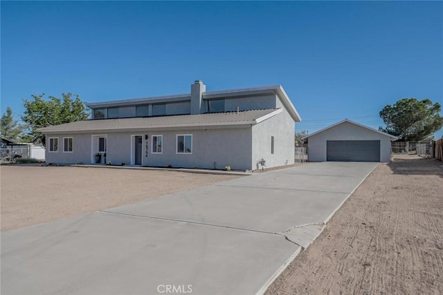 16754 Pauhaska Rd, Apple Valley, CA 92307 - ranch-style house featuring stucco siding, a detached garage, and a chimney