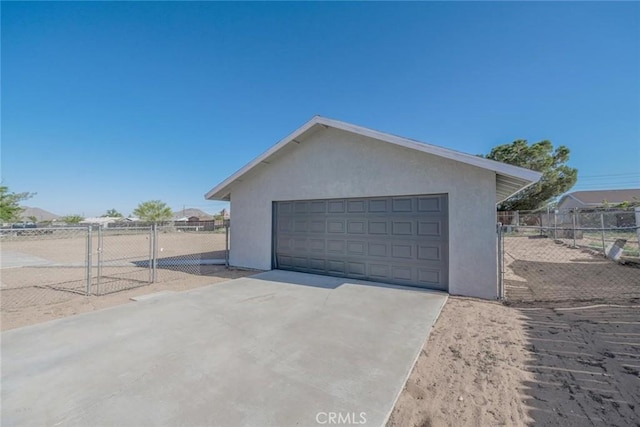 16754 Pauhaska Rd, Apple Valley, CA 92307 - detached garage featuring a gate