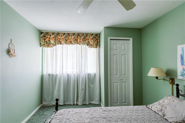 16811 Via Quedo, Desert Hot Springs, CA 92240 - bedroom with carpet, a closet, baseboards, and a ceiling fan