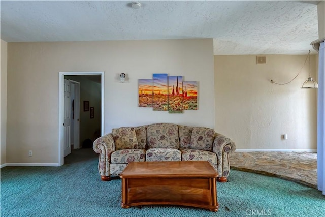 16811 Via Quedo, Desert Hot Springs, CA 92240 - living area with carpet flooring, a textured ceiling, and baseboards