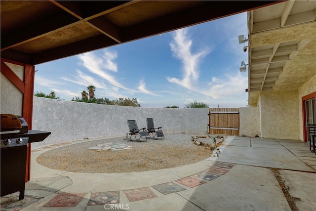 16811 Via Quedo, Desert Hot Springs, CA 92240 - view of patio with a gate and grilling area