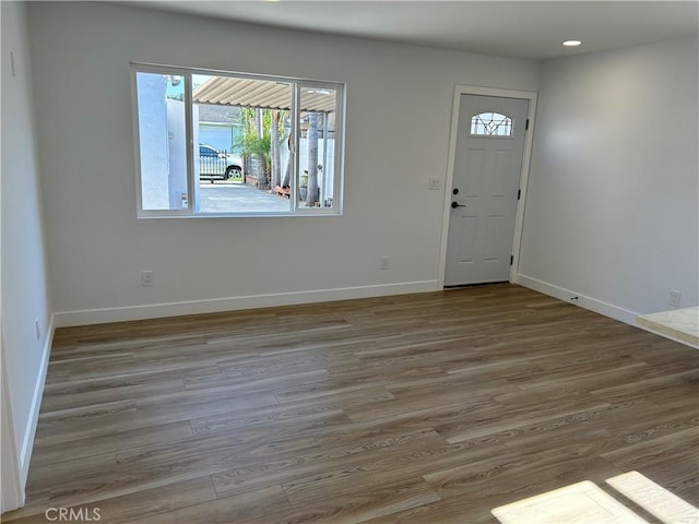 2033 W Burnett St, Long Beach, CA 90810 - foyer entrance with wood finished floors, baseboards, and recessed lighting