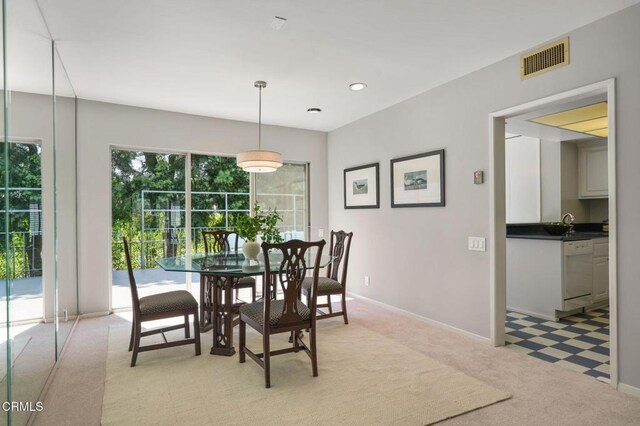 1045 S Orange Grove Blvd Unit 8, Pasadena, CA 91105 - dining area with light colored carpet and baseboards