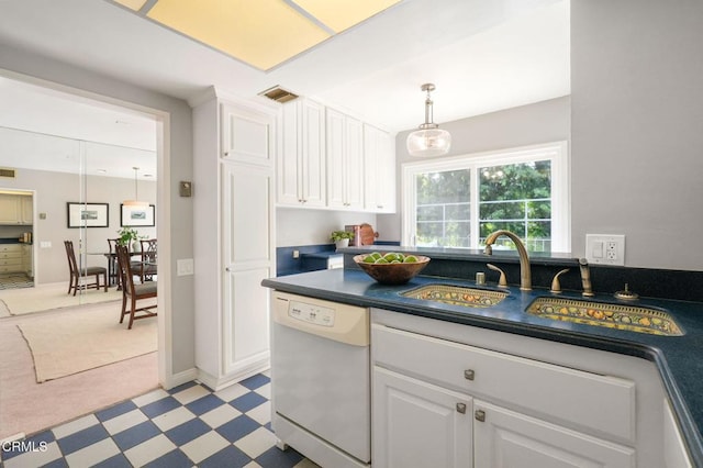 1045 S Orange Grove Blvd Unit 8, Pasadena, CA 91105 - kitchen with dishwasher, dark countertops, white cabinets, a sink, and decorative light fixtures