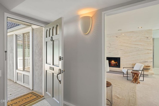 1045 S Orange Grove Blvd Unit 8, Pasadena, CA 91105 - foyer with a premium fireplace