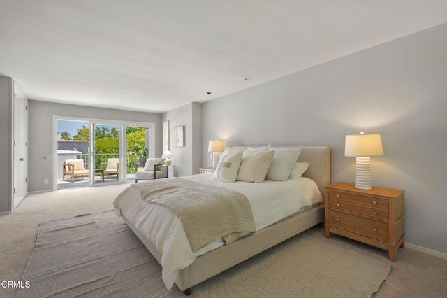 1045 S Orange Grove Blvd Unit 8, Pasadena, CA 91105 - bedroom featuring access to exterior, light carpet, and baseboards