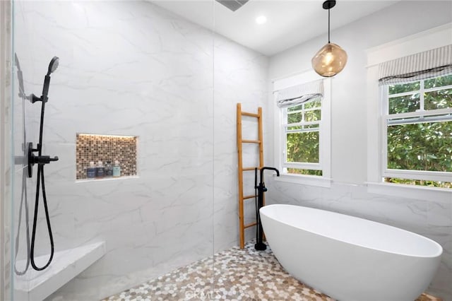620 Brooks St, Laguna Beach, CA 92651 - full bathroom with a soaking tub, tile walls, and a marble finish shower