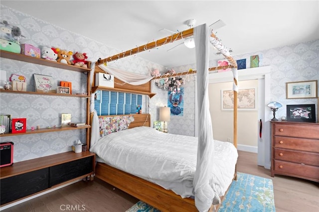 620 Brooks St, Laguna Beach, CA 92651 - bedroom featuring wallpapered walls and wood finished floors