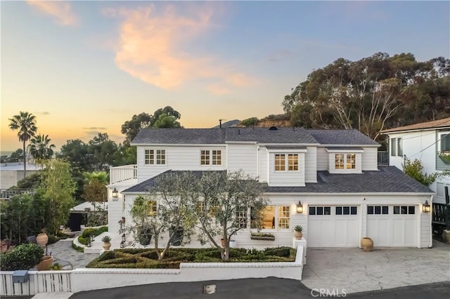 31847 8th Ave, Laguna Beach, CA 92651 - view of front of house featuring concrete driveway, a garage, and a shingled roof