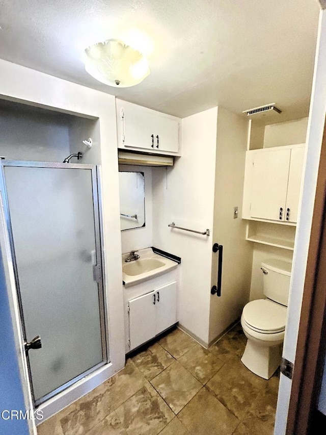 5021 Alvarado St, Carpinteria, CA 93013 - bathroom featuring a shower stall, vanity, and tile patterned flooring