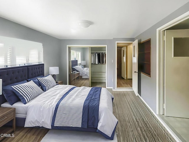 5021 Alvarado St, Carpinteria, CA 93013 - bedroom with a closet and wood finished floors