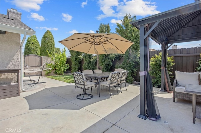 27702 Quincy St, Castaic, CA 91384 - fenced backyard featuring a patio area and outdoor dining area