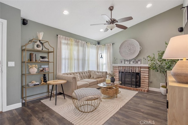 27702 Quincy St, Castaic, CA 91384 - living room featuring lofted ceiling, ceiling fan, a fireplace, wood finished floors, and baseboards