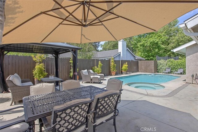 27702 Quincy St, Castaic, CA 91384 - view of pool featuring outdoor dining space, an in-ground hot tub, a gazebo, a patio, and a fenced backyard