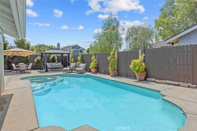 27702 Quincy St, Castaic, CA 91384 - view of pool with a gazebo, a patio, a fenced backyard, an outdoor hangout area, and a pool with connected hot tub