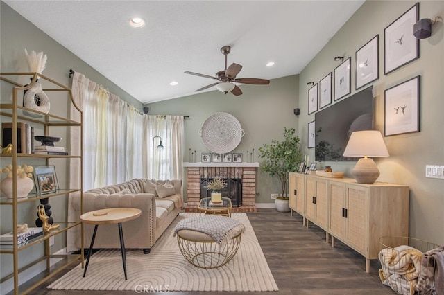 27702 Quincy St, Castaic, CA 91384 - living room with a ceiling fan, lofted ceiling, a brick fireplace, dark wood finished floors, and recessed lighting
