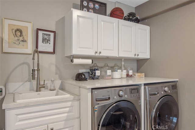 27702 Quincy St, Castaic, CA 91384 - laundry room with washer and dryer and cabinet space