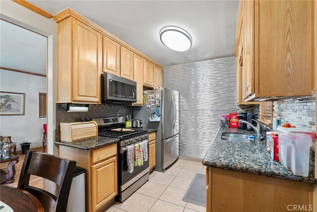 1876 Oregon Ave, Long Beach, CA 90806 - kitchen featuring stainless steel appliances, a sink, tasteful backsplash, light tile patterned flooring, and ornamental molding