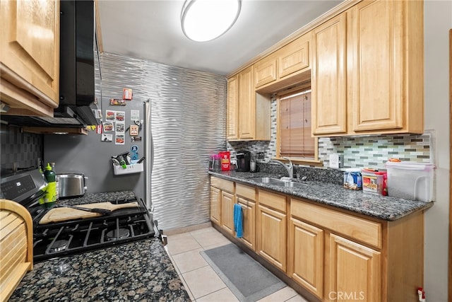 1876 Oregon Ave, Long Beach, CA 90806 - kitchen featuring a sink, range with gas stovetop, backsplash, light brown cabinets, and light tile patterned floors
