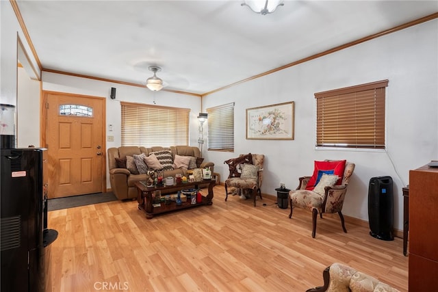 1876 Oregon Ave, Long Beach, CA 90806 - living room with crown molding, light wood finished floors, and baseboards