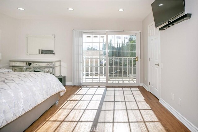 10670 Deering Ave, Chatsworth, CA 91311 - bedroom featuring access to exterior, wood finished floors, baseboards, and recessed lighting