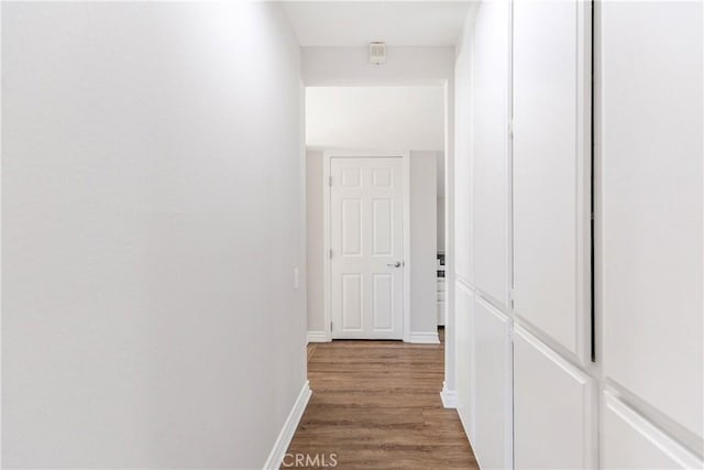 10670 Deering Ave, Chatsworth, CA 91311 - corridor with light wood finished floors and baseboards