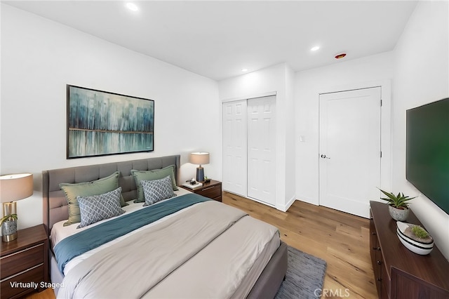 401 W Poplar St, Compton, CA 90220 - bedroom featuring wood finished floors, recessed lighting, and a closet