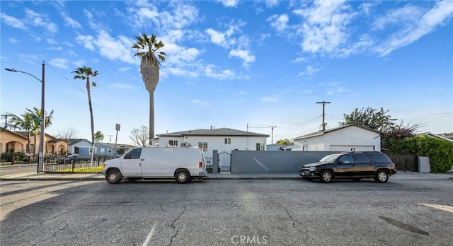 401 W Poplar St, Compton, CA 90220 - view of front of property with a residential view and a gate