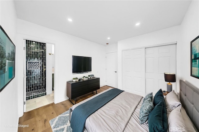 401 W Poplar St, Compton, CA 90220 - bedroom featuring wood finished floors, a closet, and recessed lighting