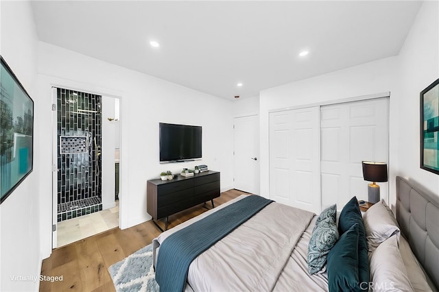 401 W Poplar St, Compton, CA 90220 - bedroom featuring wood finished floors, a closet, and recessed lighting