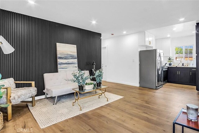 401 W Poplar St, Compton, CA 90220 - sitting room featuring light wood-type flooring and recessed lighting