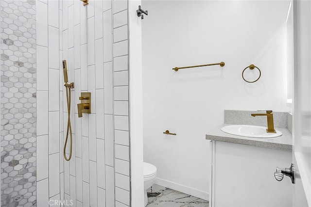 401 W Poplar St, Compton, CA 90220 - full bathroom with toilet, a tile shower, vanity, and marble finish flooring