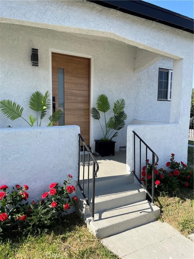 401 W Poplar St, Compton, CA 90220 - property entrance featuring stucco siding