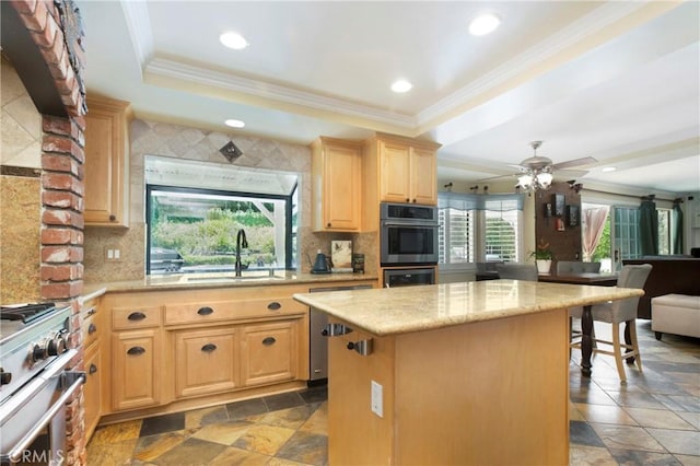 24002 Cormorant Ln, Laguna Niguel, CA 92677 - kitchen with a sink, light brown cabinets, stainless steel appliances, a raised ceiling, and crown molding