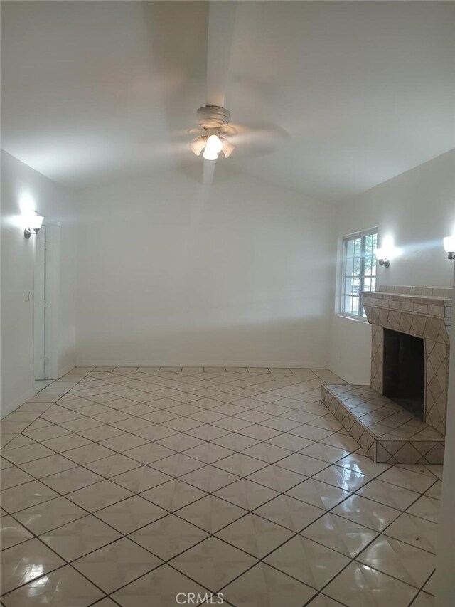 12760 Judd St, Pacoima, CA 91331 - spare room with ceiling fan, a fireplace, and light tile patterned floors